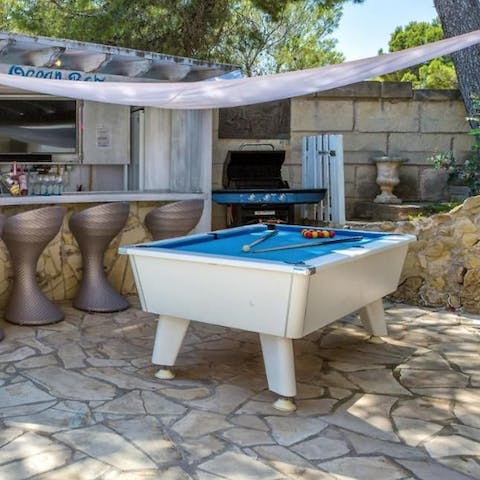 Play pool at the terrace bar area