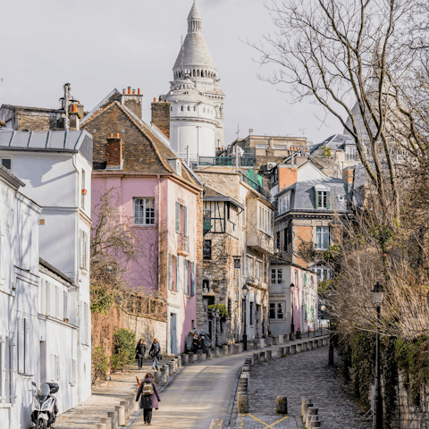 Discover Montmartre's artsy atmosphere, a thirty-minute walk away