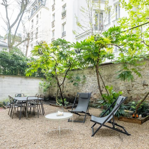 Soak up the Parisian sun in the private courtyard garden