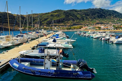 Explore Calheta Marina's waterfront cafés, boat trips, and Atlantic ocean views