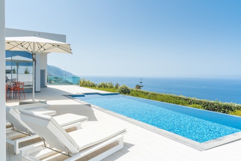 Swim out to where the pool meets the open Atlantic