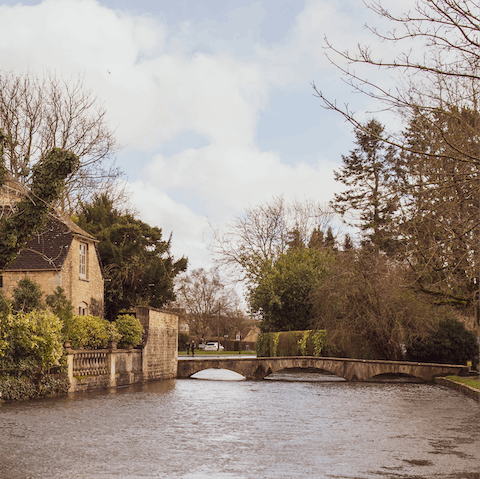 Stroll the streets of Bourton-on-the-Water, just 4.3 miles away