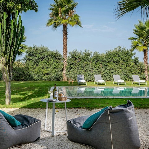 Relax by the private pool – you've got a choice of seats