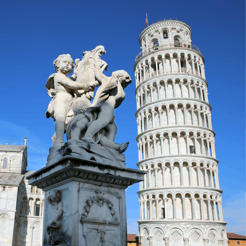 Plan a day trip to nearby Pisa and the famous tower