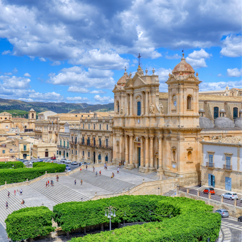 Explore Noto Cathedral, a thirty-six minute drive away