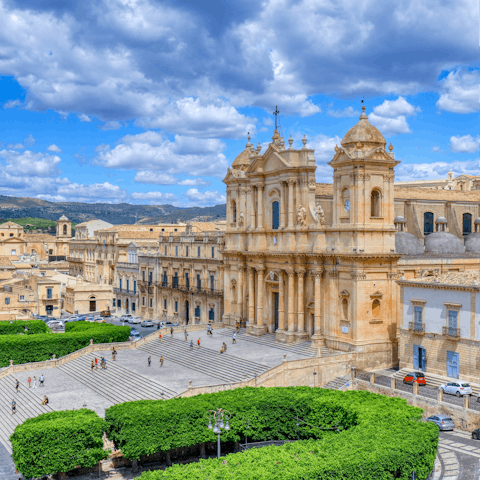 Explore Noto Cathedral, a thirty-six minute drive away
