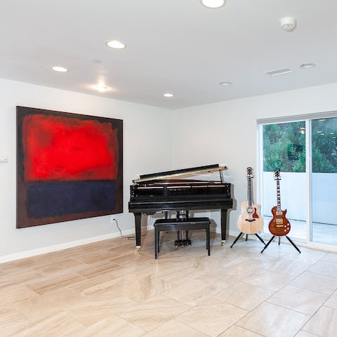 Flex your musical muscles on the baby grand piano