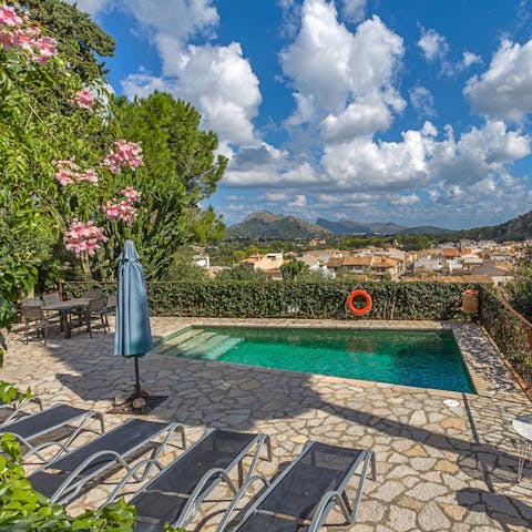 Soak up the breathtaking views of Pollensa from the private poolside