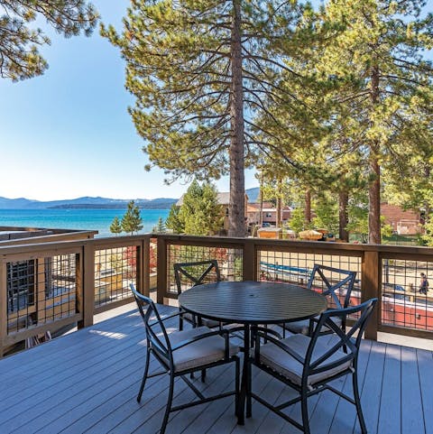 Gather around the well sized deck with views over the lake