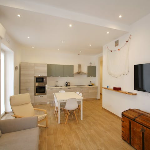 Relax, cook and dine in the airy open-plan living space