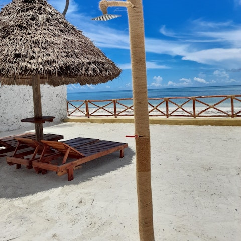 Lounge on the sun beds to catch a tan while sipping cocktails