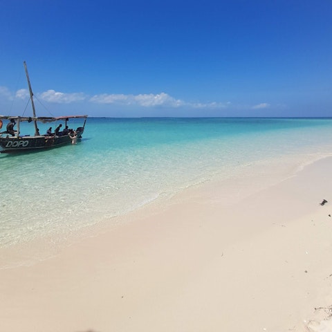 Walk out onto the gorgeous white sand of the beach right on your doorstep