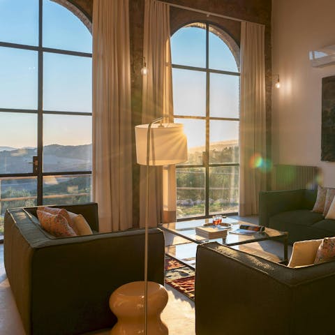 Admire sweeping views of the Tuscan countryside from this elegant home