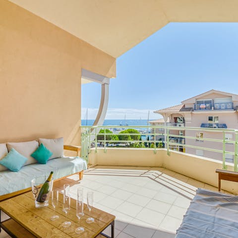 Pair your champagne with sparkling sea views