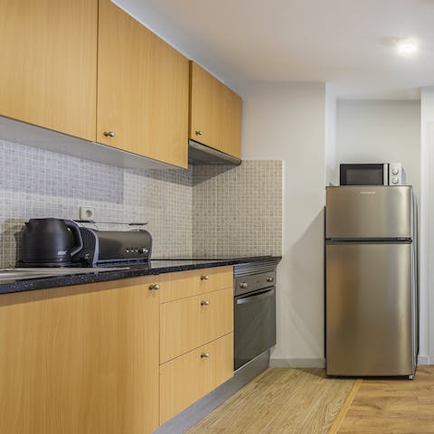 Prepare delicious meals in the fully-equipped kitchen