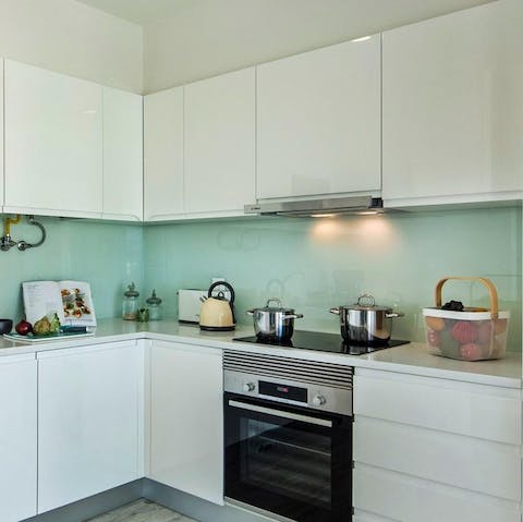 Rustle up a delicious dinner in the sleek, modern kitchen