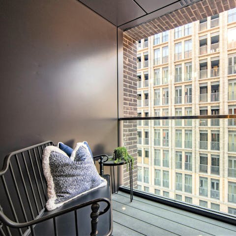 Enjoy your morning coffee on the balcony as London wakes below
