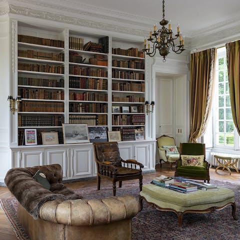 Pick a book from the shelves and flop down on the sofa in peace