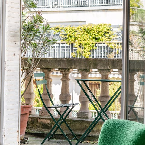 Take in the city from the height of the balcony