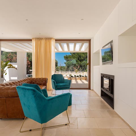 Snuggle up in front of a movie with the fireplace going on cooler evenings