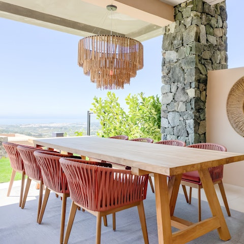 Gather around the table for a Mediterranean feast under the pergola