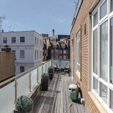 Tuck into a light bite on the balcony