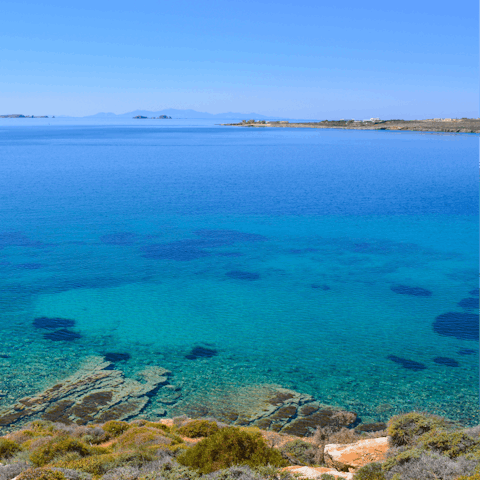 Dip your toes in the turquoise Aegean waters