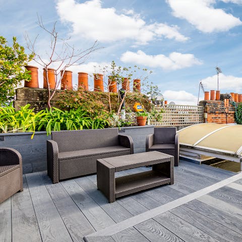 Relax on the roof terrace, a G&T in hand, and admire the view