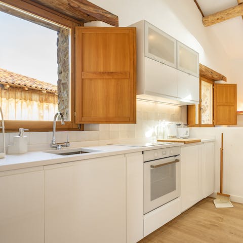Prepare meals in the light-filled kitchen
