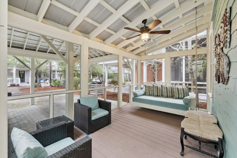 Catch the coastal breeze from the screened porch