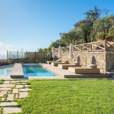 Sunbathe on the pool terrace