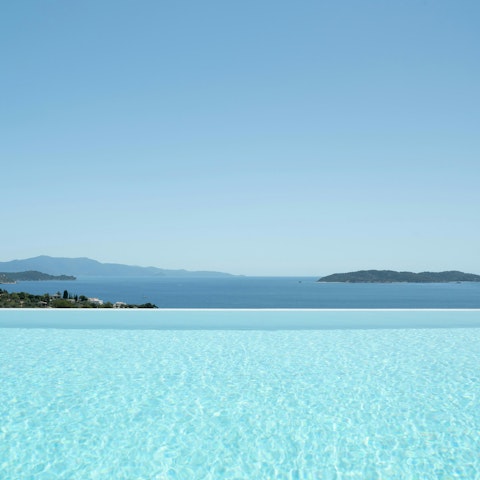 Take in the Aegean views from the pool