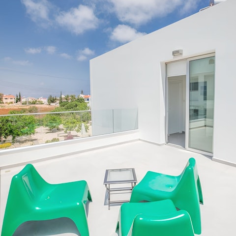 Take your morning coffee or evening drinks onto the balcony