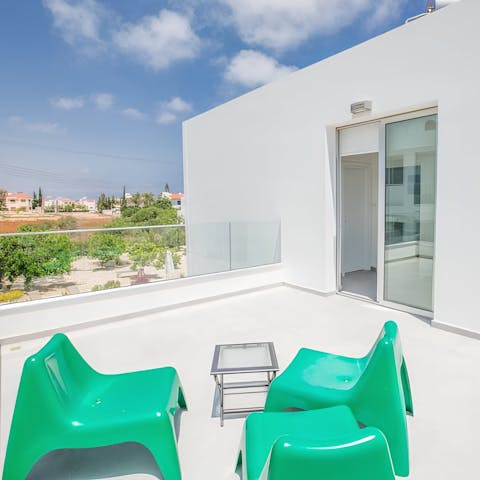 Take your morning coffee or evening drinks onto the balcony