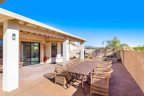Dine alfresco on the patio with mountain views as your backdrop