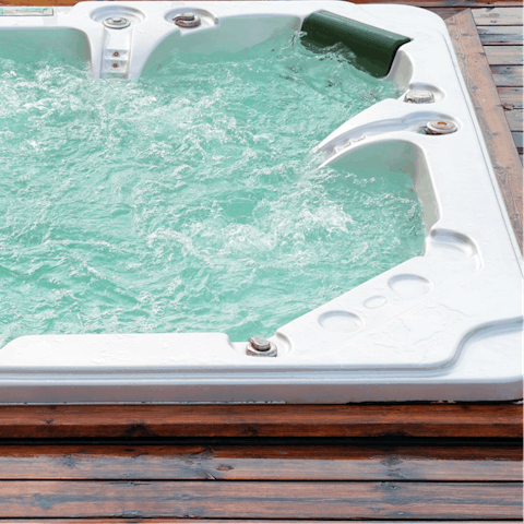 Gaze at the desert sky as you unwind in the hot tub