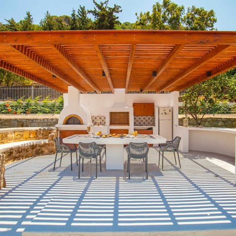 Enjoy a family barbecue out on the covered patio