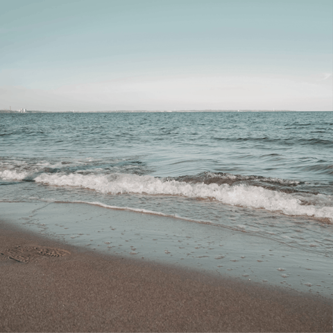 Drive to Galé-Fontainhas Beach with its golden sands and jagged cliffs