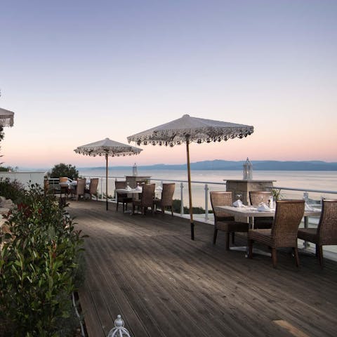 Dine on creative cuisine overlooking Toroneos Bay