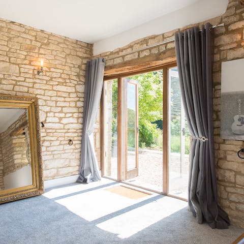 Step straight out into the garden from the main bedroom