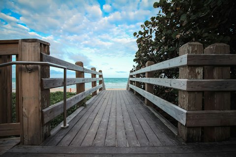 Explore Miami Beach's oceanfront boardwalk lined with Art Deco architecture, a seventeen-minute drive