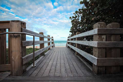 Explore Miami Beach's oceanfront boardwalk lined with Art Deco architecture, a seventeen-minute drive