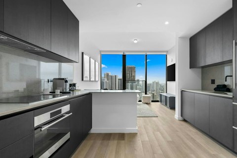 Admire the city skyline from the open-plan living area