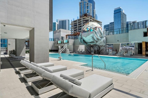 Lounge by the rooftop pool before enjoying a swim