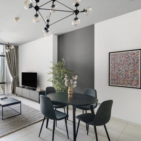 Gather around the sleek dining table for sweet chai tea