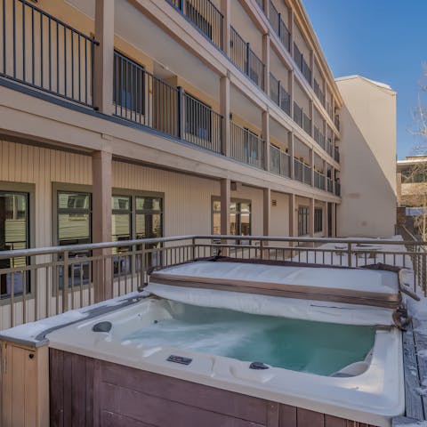 Enjoy a soak in the building's shared hot tub