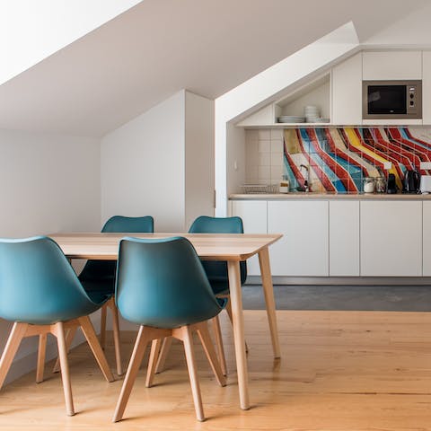 Prepare a meal in the colourful kitchen with produce from the Time Out Market, a three-minute saunter away