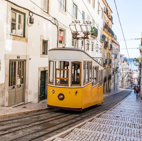 Take a ride on the Elevador da Bica, just a three-minute stroll away
