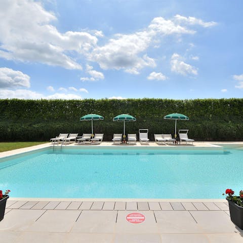Cool off from the Tuscan sun in the shared pool