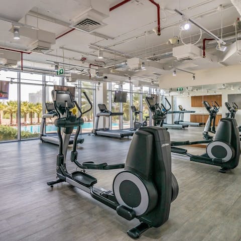 Stay on top of your fitness goals with a workout at the communal gym